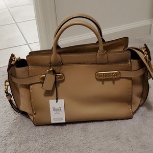 NWT Coach double swagger bag.